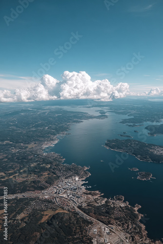 Wallpaper Mural aerial photography serene beauty of nature and urban landscapes from above featuring lakes reflecting clouds on Torontodigital.ca