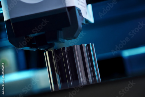 Innovative 3D Printer Creating a Detailed Object in a Modern Workshop Setting