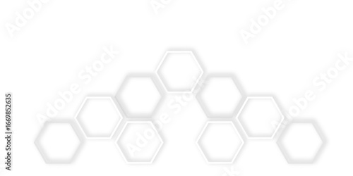 Abstract white and gray hexagons with subtle shadows, clean, modern background featuring a repeating pattern creating a three dimensional effect.	