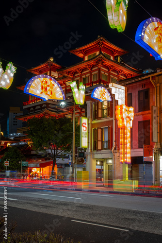 Chinatown in Singapore lights up during the Chinese New Year and Mid-Autumn Festival, creating a beautiful night scene in the city.