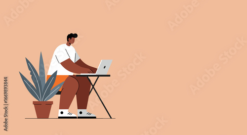 A man works casually on his laptop at home, embodying remote work, productivity, and modern lifestyle. Ideal for business and technology themes.