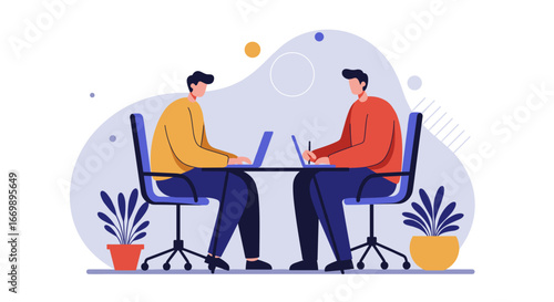 Two men working collaboratively on laptops at a desk in a modern office, representing teamwork, business, and remote work.