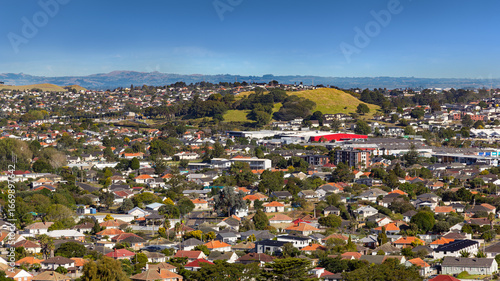 Auckland, New Zealand. Extinct volcano Mount Roskill also known as Puketāpapa and Pukewīwī, and surrounding suburbs with area of state housing. View from Ōwairaka Mount Albert.