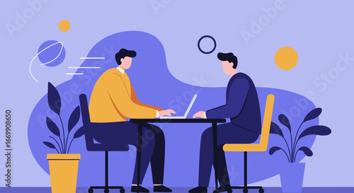 Two professionals collaborate on laptops at a desk in a modern office, symbolizing teamwork, productivity, and professional discussion. Ideal for business, technology, or corporate themes.