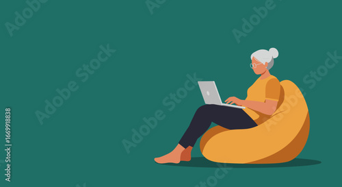 Elderly woman comfortably working or studying on a laptop from a beanbag chair. Depicts remote work, online learning, or digital lifestyle for seniors.