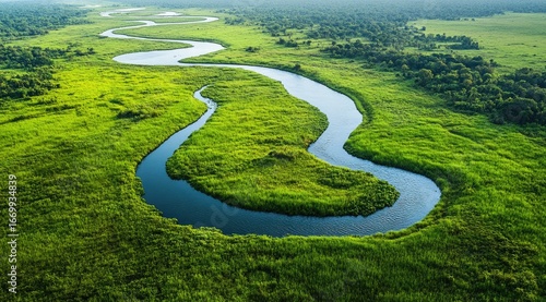 Wallpaper Mural Serpentine river winds through lush green landscape (3) Torontodigital.ca