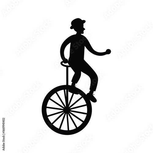 silhouette of a man riding a bike