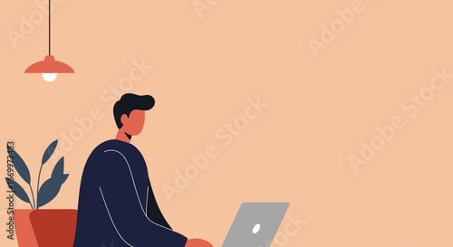 A man focused on working remotely on his laptop in a minimalist home office setup, ideal for modern business, remote work, and digital lifestyle concepts.