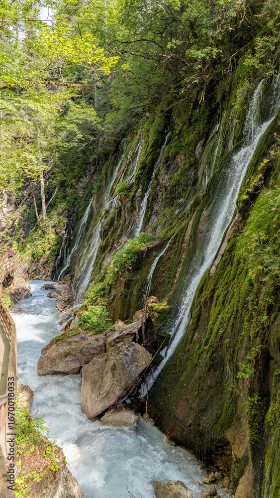 Naklejka premium Lots of water after rainfall in the Wimbachklamm in Bavaria