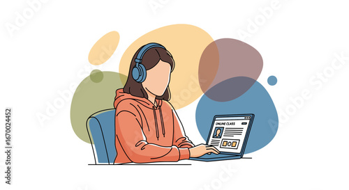Student learning online with headphones and laptop