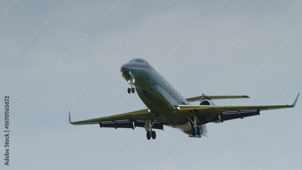 Fototapeta premium Airplane on final approach at Eindhoven Airport