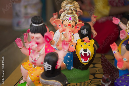 Canvas Print Lord Ganesha idol for Ganesh Chaturthi festival in India, Colorful Ganpati statue Stock Photo, Lord Ganesha murti