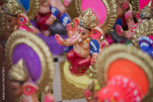 Photography Lord Ganesha idol for Ganesh Chaturthi festival in India, Colorful Ganpati statue Stock Photo, Lord Ganesha murti