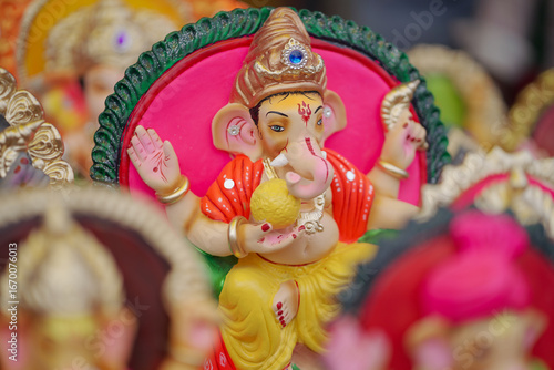 Canvas Print Lord Ganesha idol for Ganesh Chaturthi festival in India, Colorful Ganpati statue Stock Photo, Lord Ganesha murti
