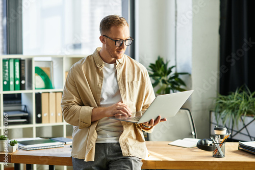 Photography Handsome young businessman working diligently in a modern office environment
