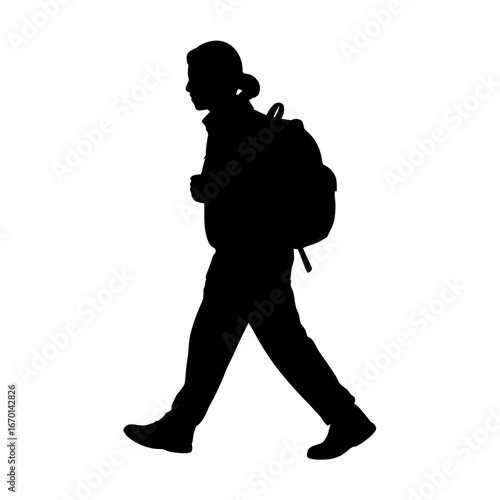 Silhouette of a person with a backpack walking