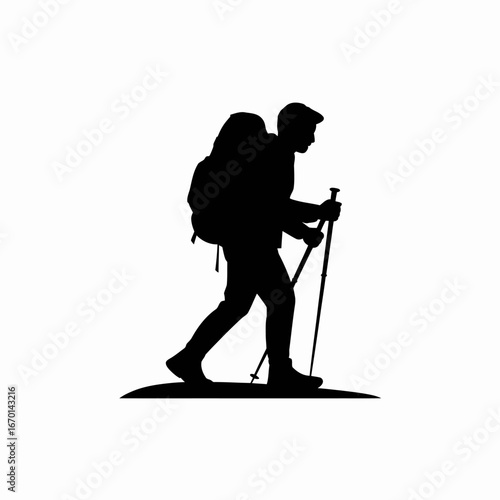 Silhouette of a hiker with backpack and trekking poles