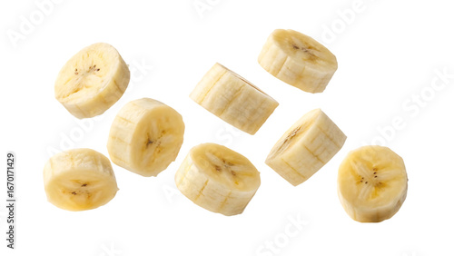 flying delicious banana slices cut out isolated on white background