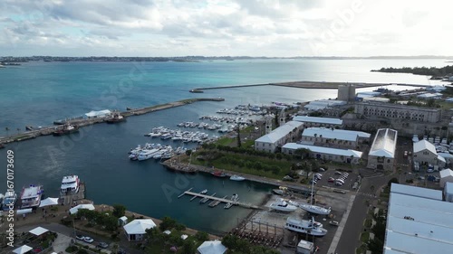 4K Aerial Drone Footage of Bermuda Island to Docked Boats under Partly Cloudy Sky