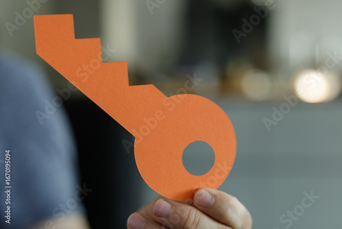 Image of a hand holding an ...