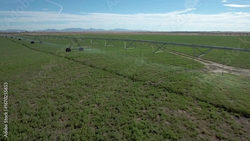Yuma Arizona USA – 4K Drone Aerial of Irrigation and Circular Crop Fields with Tractors