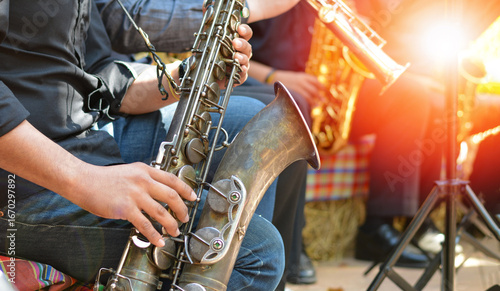 International jazz day and World Jazz festival. Saxophone, music instrument played by saxophonist player musician in fest.