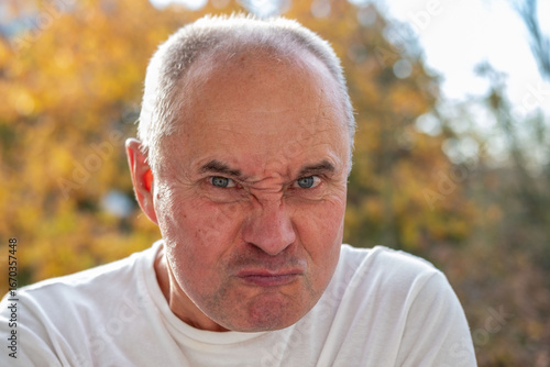 Angry Aggressive Stressed senior man, visual person experiencing intense frustration, Confrontation and conflict, stress, modern life pressures, Mental health issues, Workplace frustration, upset face