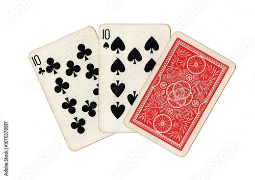 A hand of three vintage playing cards with two cards revealed on a white background.