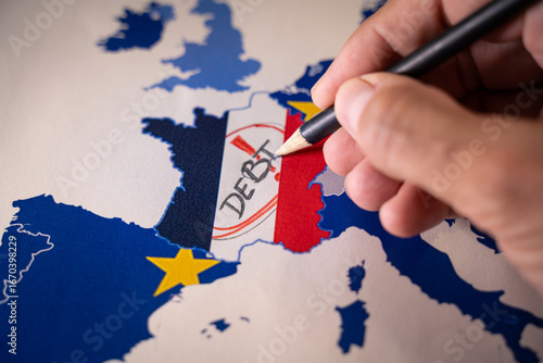 Hand drawing DEBT over a map of France with its national flag, surrounded by the European Union map. Symbolizing the French economic crisis, national debt, and the potential Frexit scenario within the