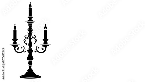 An elegant candelabra stands alone, casting a soft glow, creating a striking visual of historical charm.