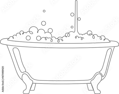 Vintage bathtub filled with bubbles and foam ready for a relaxing bath time