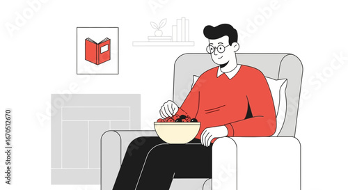 Enjoying Quiet Moments Indoor A Young Man Relaxes With Bowl of Cherries