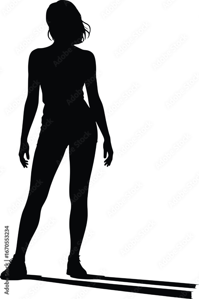 Obraz premium Silhouette of a woman standing with a long shadow
