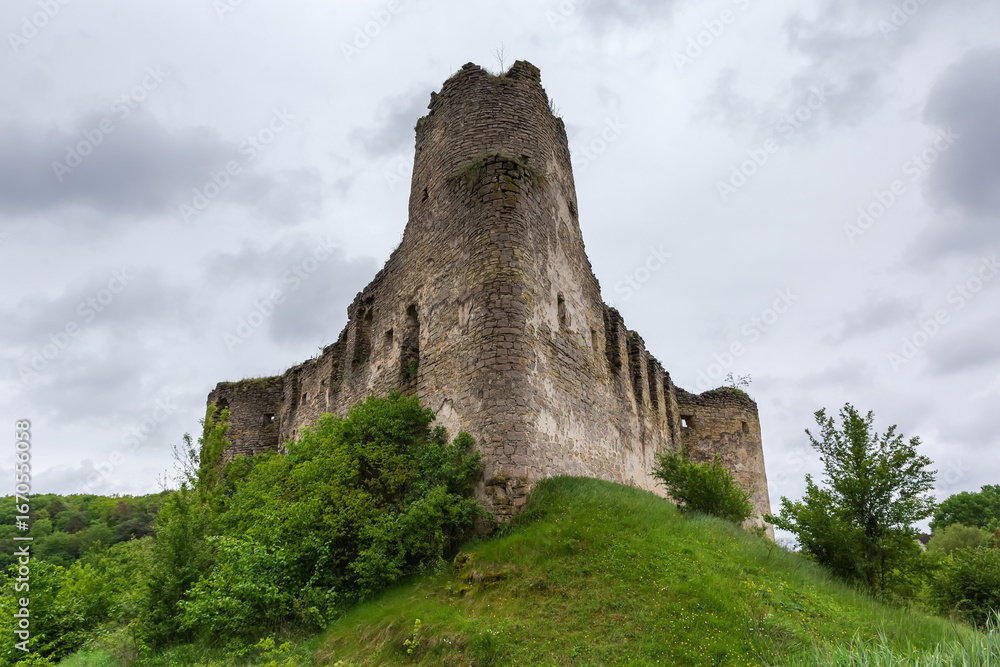 Fototapeta premium Damaged north stone watchtower of medieval Sydoriv Castle, Ukraine