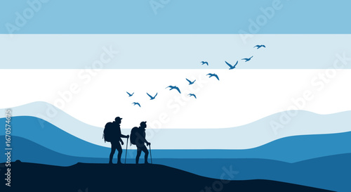 Two Hikers Explore The Tranquil Mountains Surrounded By Soaring Birds