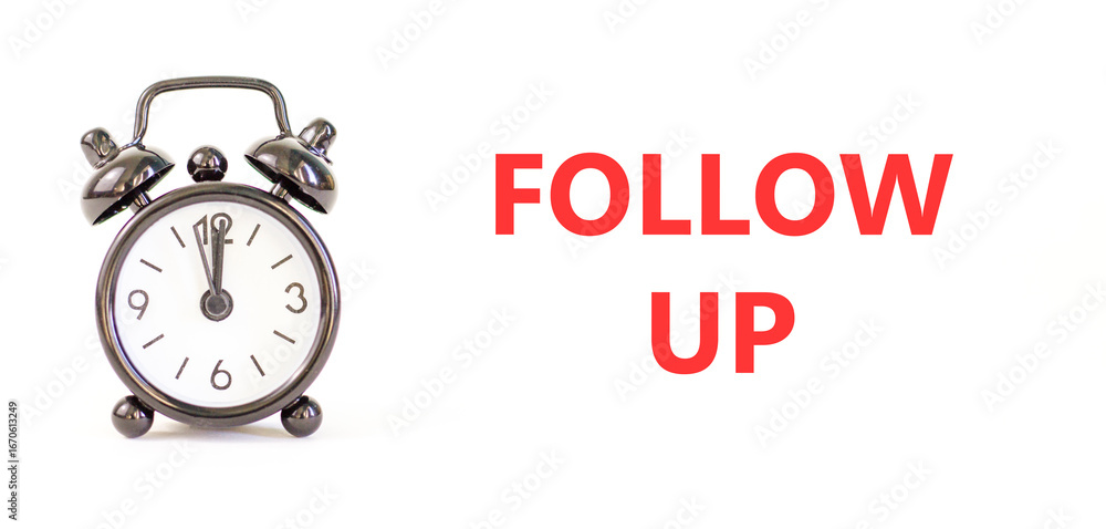 Follow up symbol. Concept word Follow up on beautiful white paper. Beautiful black alarm clock. Beautiful white paper background. Business follow up concept. Copy space. Follow up symbol. Concept word Follow up on beautiful white paper. Beautiful black alarm clock. Beautiful white paper background. Business follow up concept. Copy space.