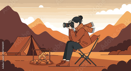 Woman Photographer Capturing Mountain Views From Cozy Campsite At Sunset