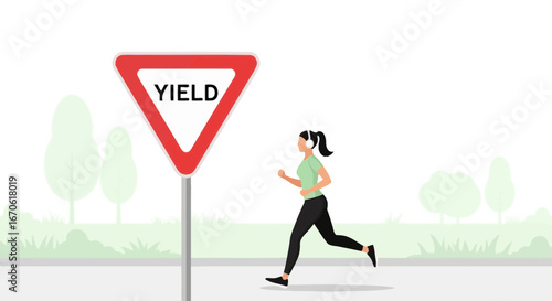Woman Running On A City Street Past A Yield Sign During Morning Jog