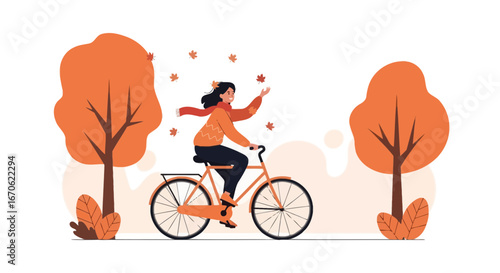 Woman Enjoying Autumn Season Riding Bicycle Through Park With Falling Leaves