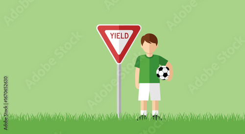 Young Soccer Player Holds Ball Next To Yield Sign On Green Field