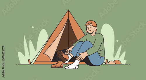 Young woman camping alone, taking off her shoes near the tent with nature scenery in the background