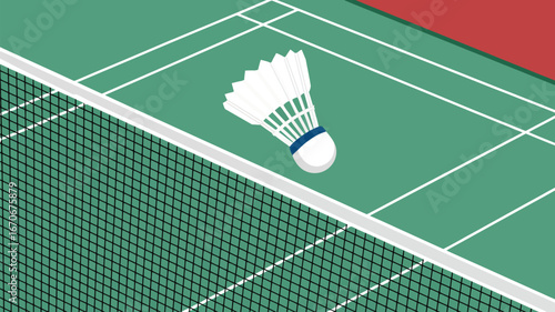 A badminton shuttlecock on a green court near a net with white lines and a red area in the corner