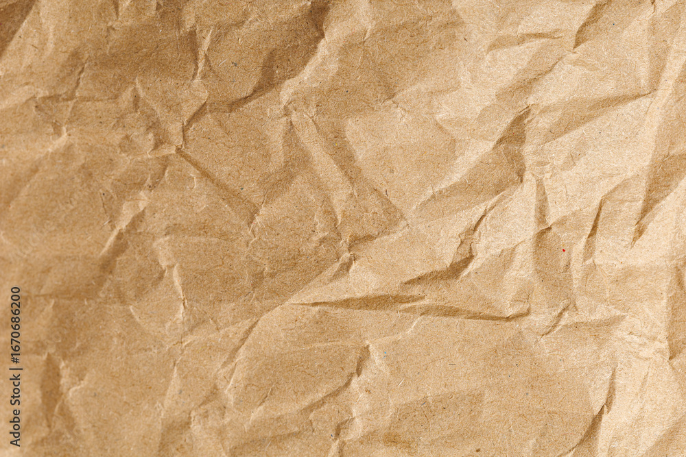 Obraz premium Brown texture kraft paper, recycled cardstock. Old crumpled recycled paper of old crumpled recycled paper