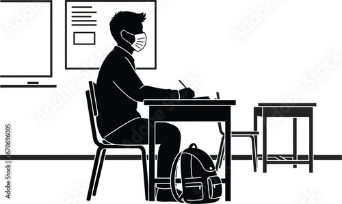 Silhouette of a student wearing a mask at a desk in a classroom, representing education during pandemic and new normal for students