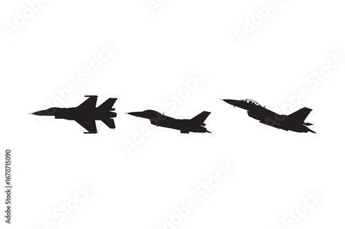 Silhouettes of three fighter jets in flight