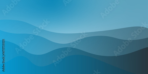 Abstract blue background with a silhouette of a mountain range shrouded in mist and fog at sunrise