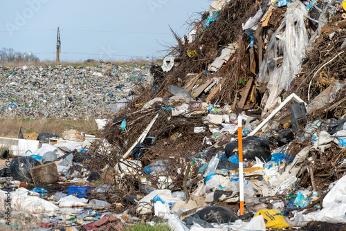 фотографія Littered landscape at a waste site reveals the extent of environmental pollution