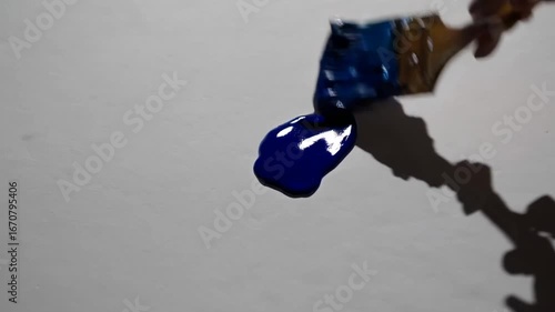 deep blue paint blotch on white background
