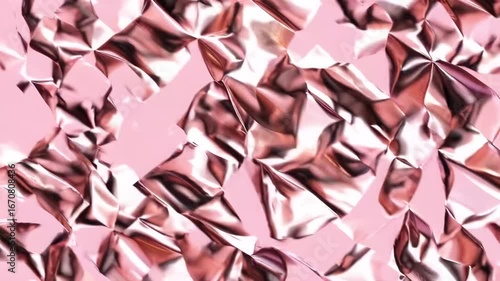 seamless repeating pattern of rose gold and millennial pink foil texture resembling wrinkled paper for use as sparkling abstract metallic background