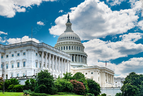 Classical architecture of the U.S. Capitol shines in daylight. A timeless image of American federal power.